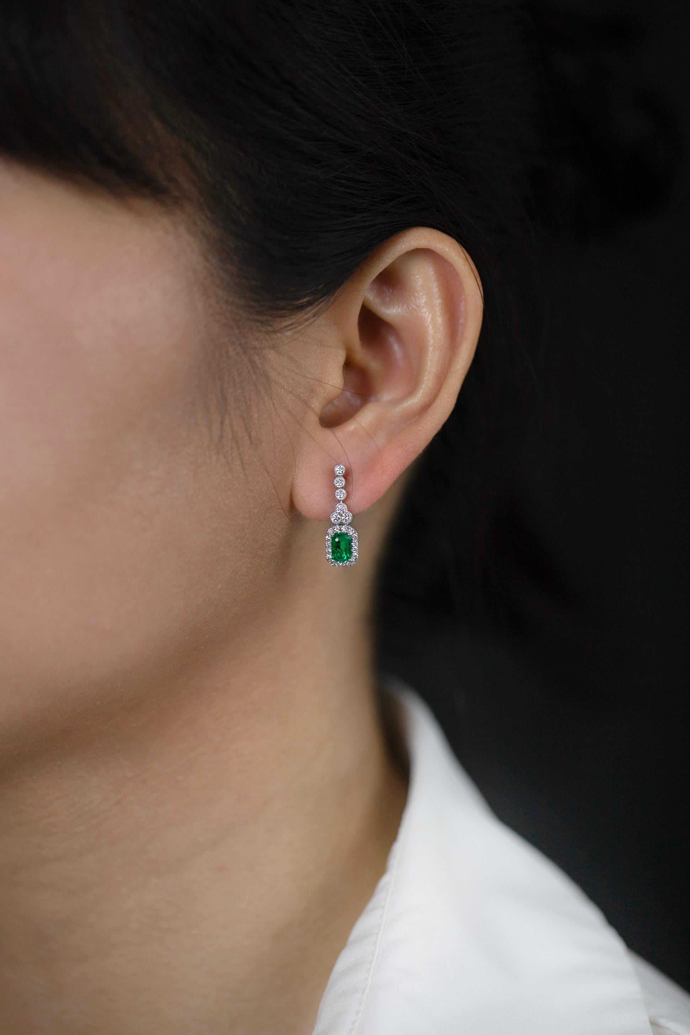1.02 Carats Total Emerald Cut Green Emerald & Round Diamond Halo Dangle Earrings For Sale 1