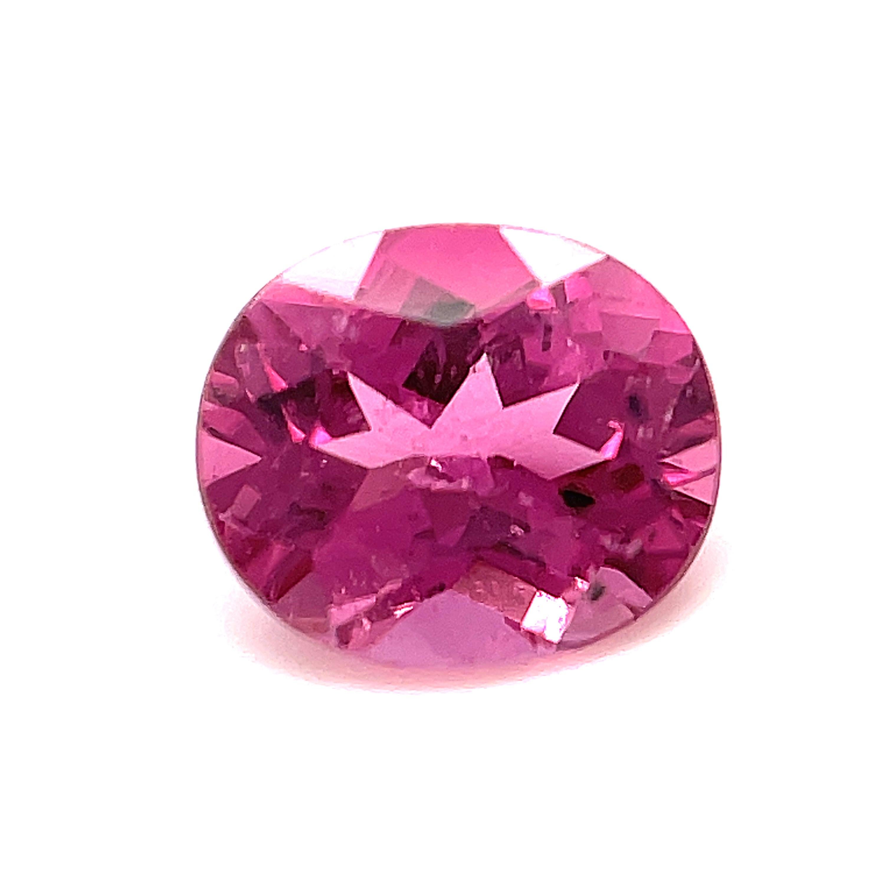 This 1.02 carat oval pink tourmaline is sure to put a smile on your face! With its slightly purplish pink hue and pleasing shape, this sparkling gemstone would make a very pretty ring or pendant for the special someone in your life! Measuring 6.93 x
