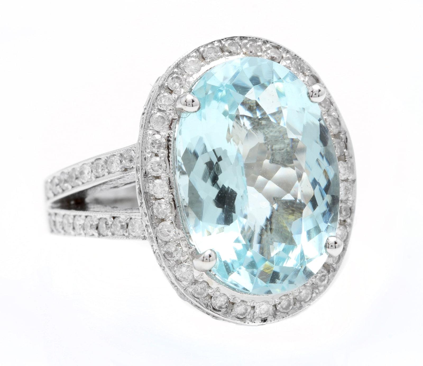 10.20 Carats Natural Impressive Natural Aquamarine and Diamond 14K White Gold Ring

Suggested Replacement Value $8,500.00

Total Natural Aquamarine Weight is: Approx. 9.00 Carats 

Aquamarine Measures: Approx. 17.00 x 12.00mm

Aquamarine Treatment: