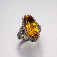 10.20 Imperial Topaz Idar Oberstein-cut Cognac color 3.64cts.  18k Diamond Ring