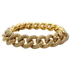 Bracelet à maillons cubains en or jaune 10,20 carats et diamants
