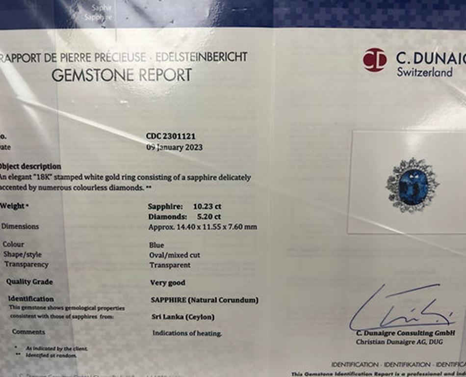 Sapphire Weight: 10.23 cts, Diamond Weight: 5.20 cts, Metal: 18K White Gold, Ring Size 6.5, Hardness: 9, Origin: Ceylon/Sri Lanka, Birthstone: September, CD Certified