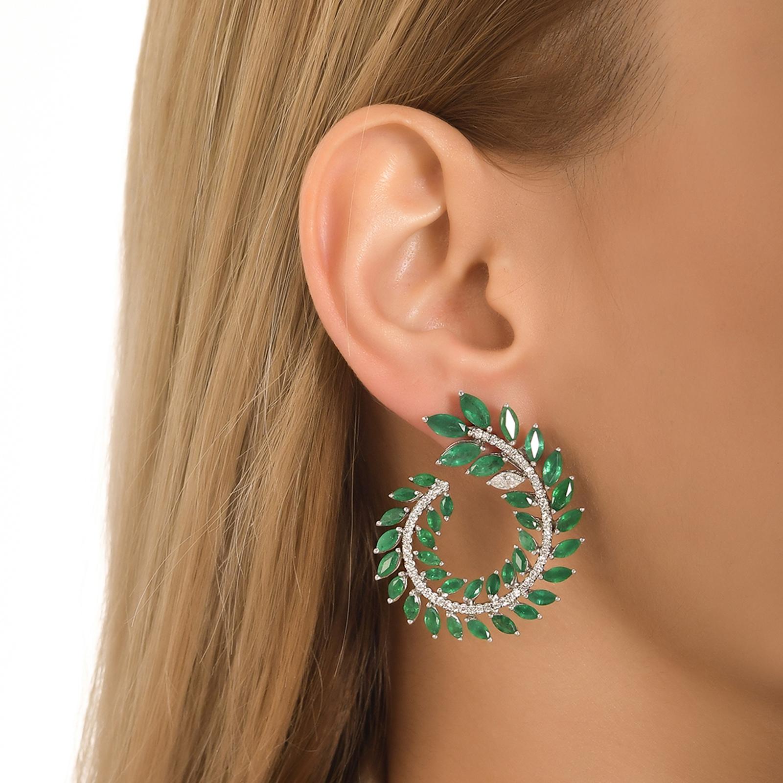 These glam galore dramatic emerald and diamond leaf earrings come in various types of 18K white gold, yellow gold, rose gold can be customized.

These delicate and sparkling earrings would be the perfect accessory for any evening occasion.

18 Karat