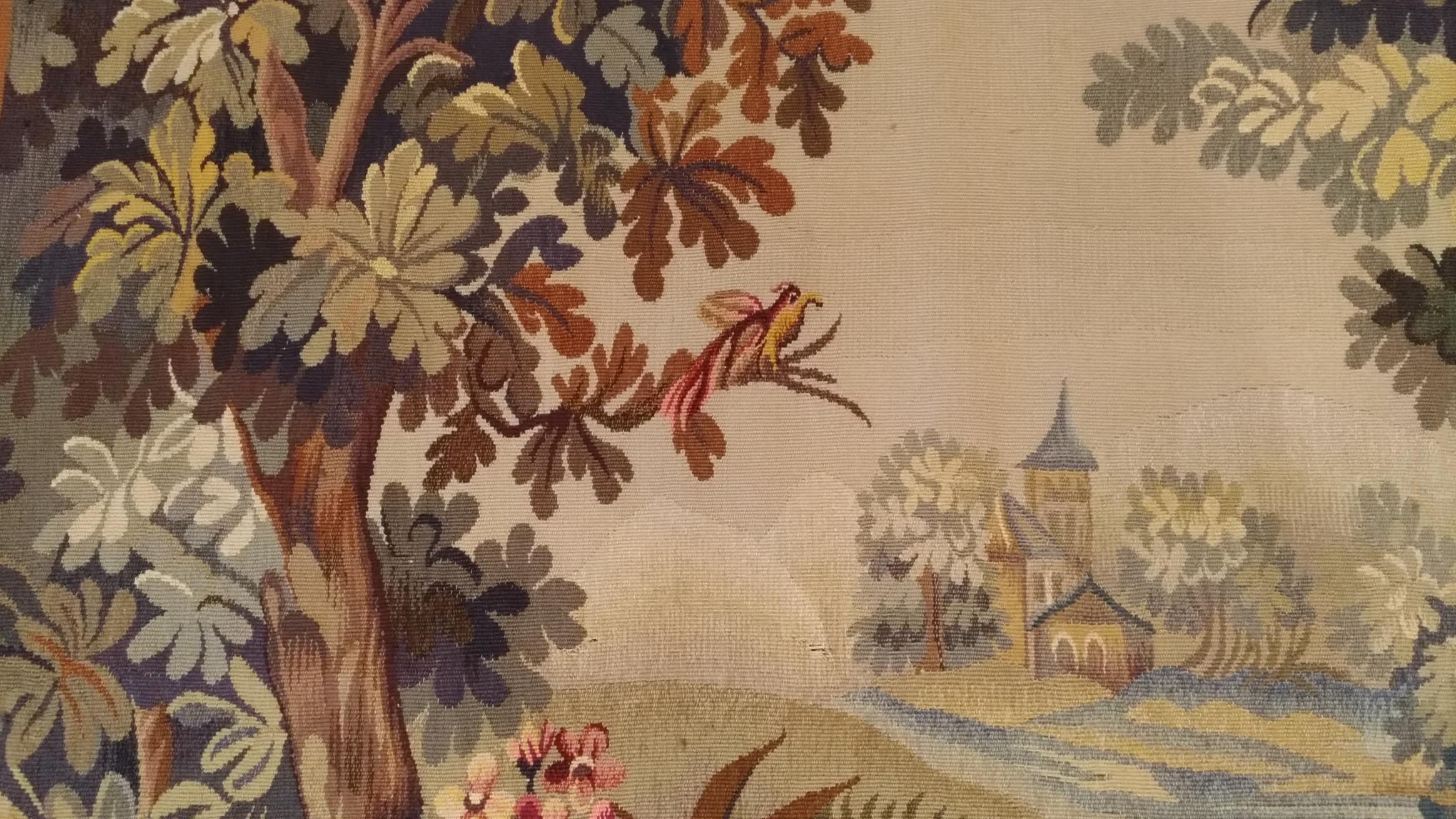 1025 - 19th century French Aubusson tapestry depicting a landscape scene with flora and fauna in rich colors, and exhibiting a Classic style perfect for many types of décor, Circa 1880.