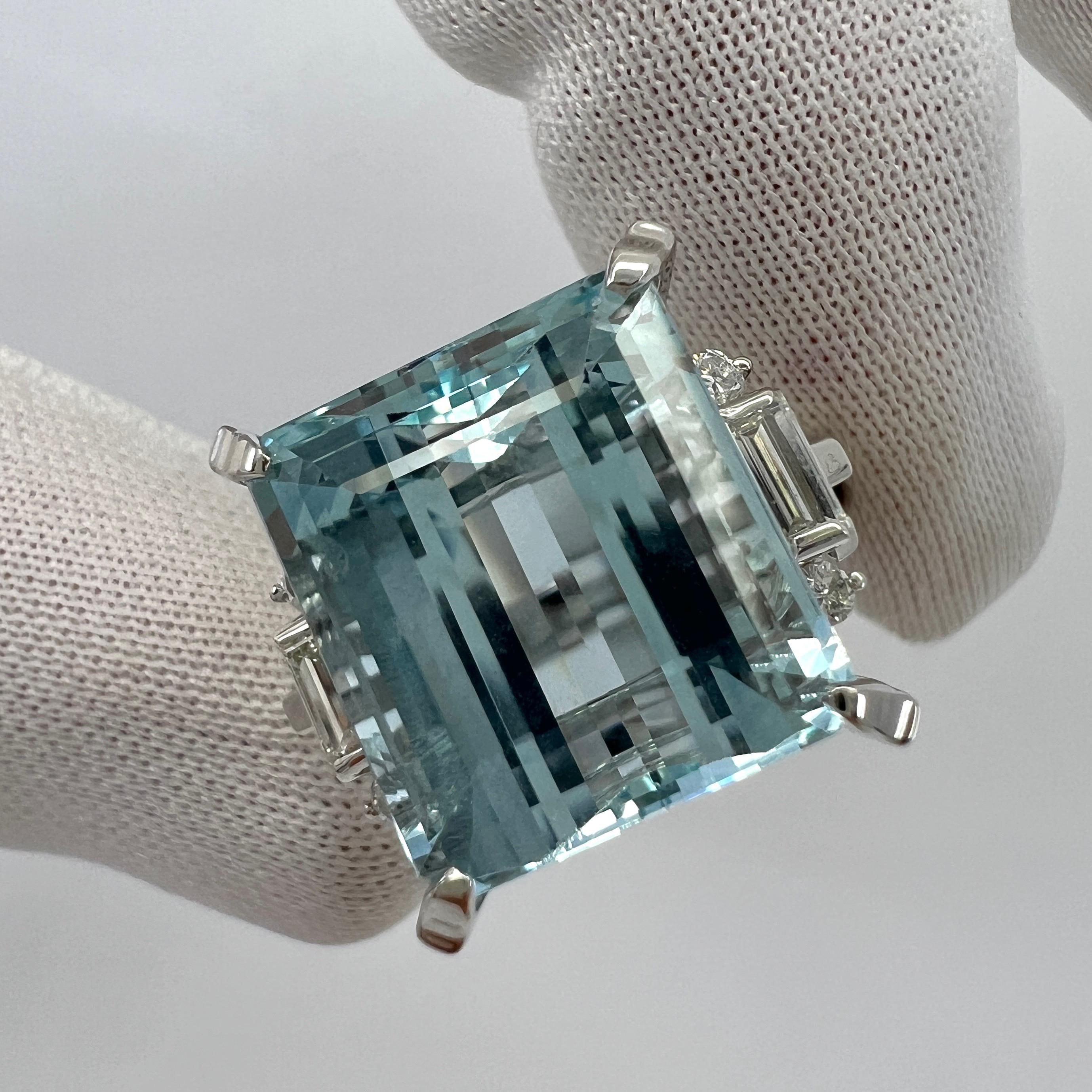 Large Blue Aquamarine And Diamond Art Deco Platinum Ring.

Stunning platinum ring with a large 10.25 carat light blue aquamarine. 
A bright blue stone with excellent clarity and a superb emerald cut. A top grade aquamarine of excellent quality. VVS