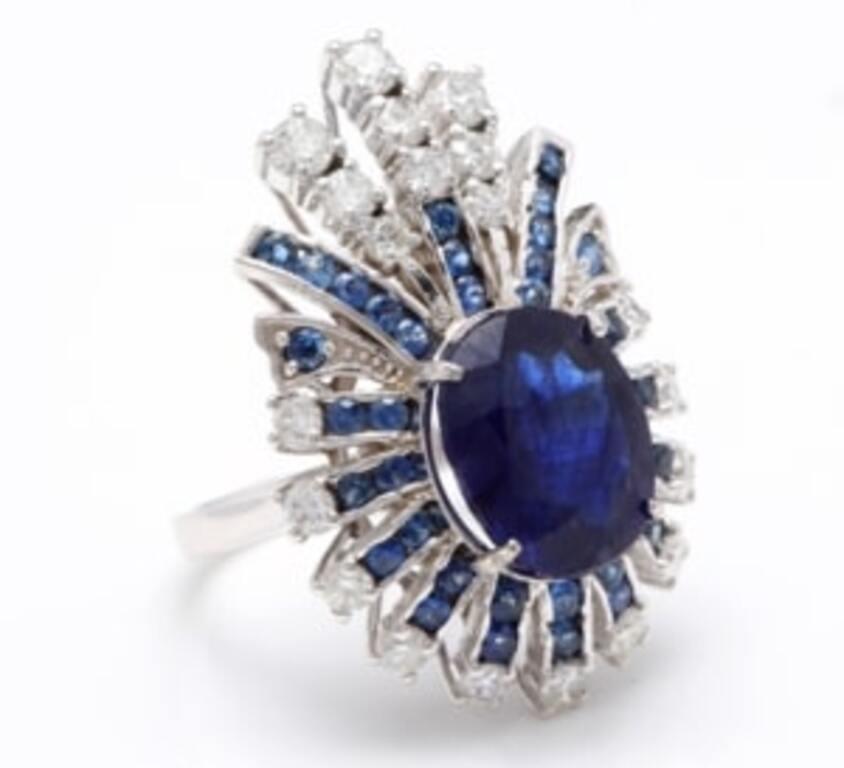 10.25 Carats Exquisite Natural Blue Sapphire and Diamond 14K Solid White Gold Ring

Total Center Blue Sapphire Weight is: Approx. 8.00 Carats (Treatment - Diffusion)

Sapphire Measures: Approx. 13.00 x 10.50mm

Natural Round Diamonds Weight: Approx.