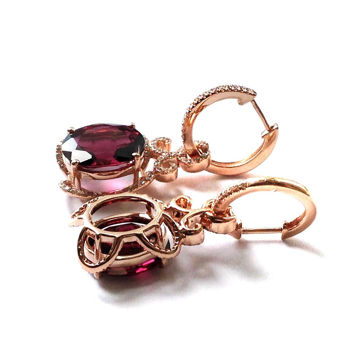 Introducing a stunning pair of Rhodolite Garnet earrings, harmoniously blending the hues of purple and red. Carefully selected for their exceptional quality, each garnet weighs 10.27 carats and is beautifully set in a 14K Rose Gold setting. The rose
