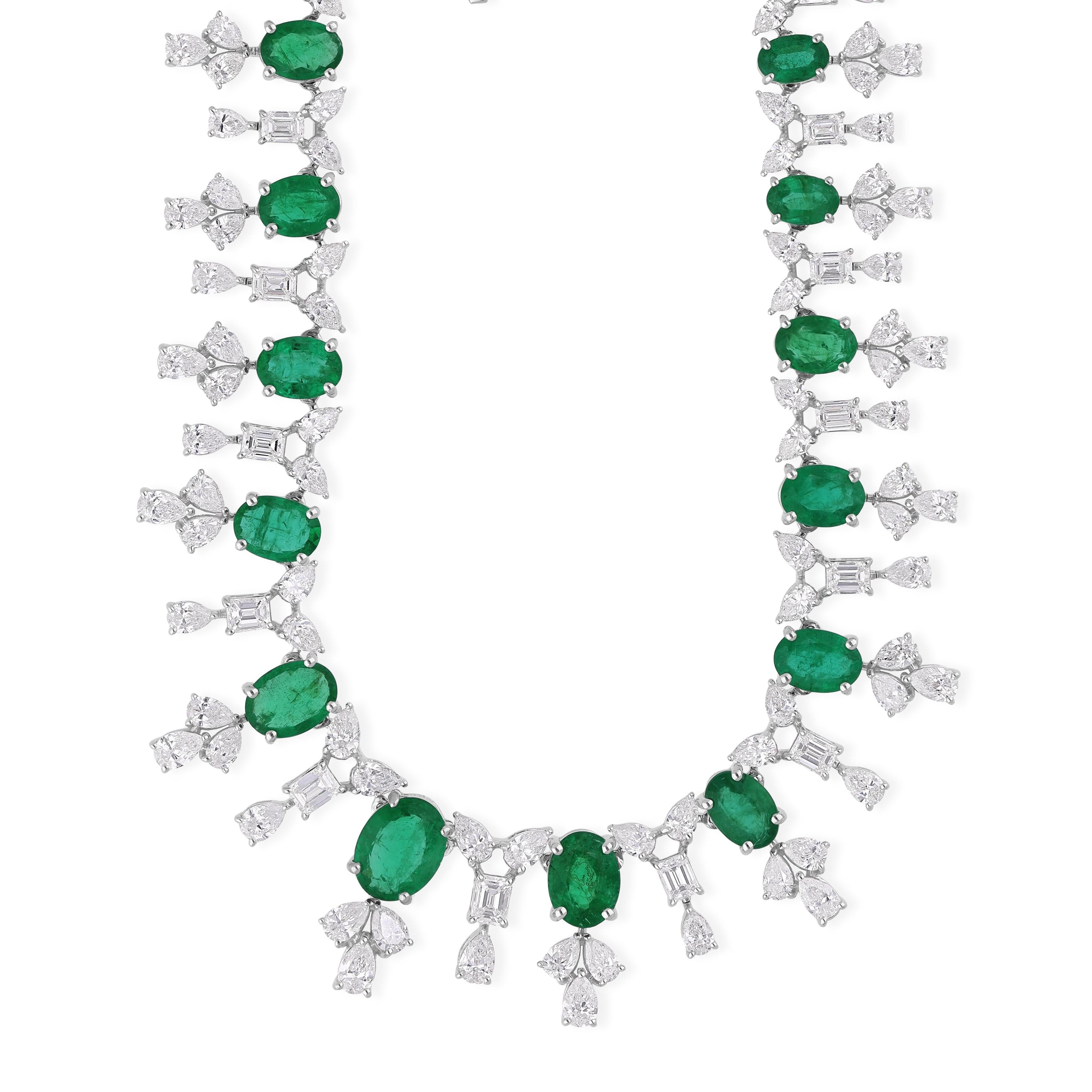 Cast from 14k-karat gold, these exquisite necklace is handset with 10.27 carats Zambian emerald and 10.64 carats of sparkling diamonds.

FOLLOW SPECTRUM JEWELS storefront to view the latest collection & exclusive pieces. Spectrum Jewels is proudly