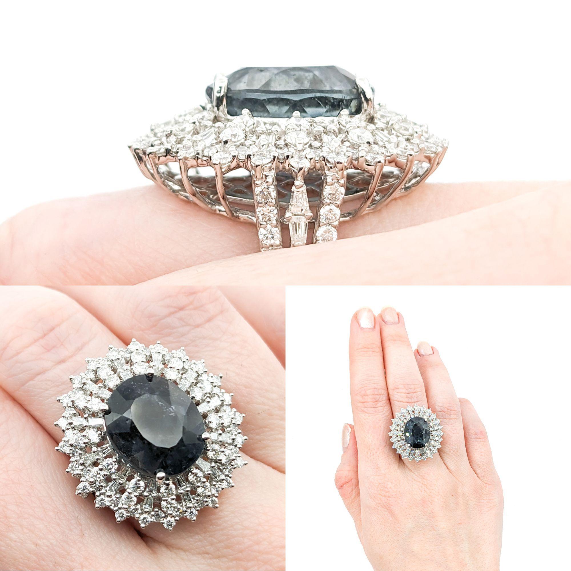 10.27ct Gray Tourmaline & 2.29ctw Diamond Ring In Platinum

Introducing this Truly unique grey tourmaline Ring crafted in premium Platinum. This luxurious piece features a captivating 10.27ct Tourmaline centerpiece with a mesmerizing grey