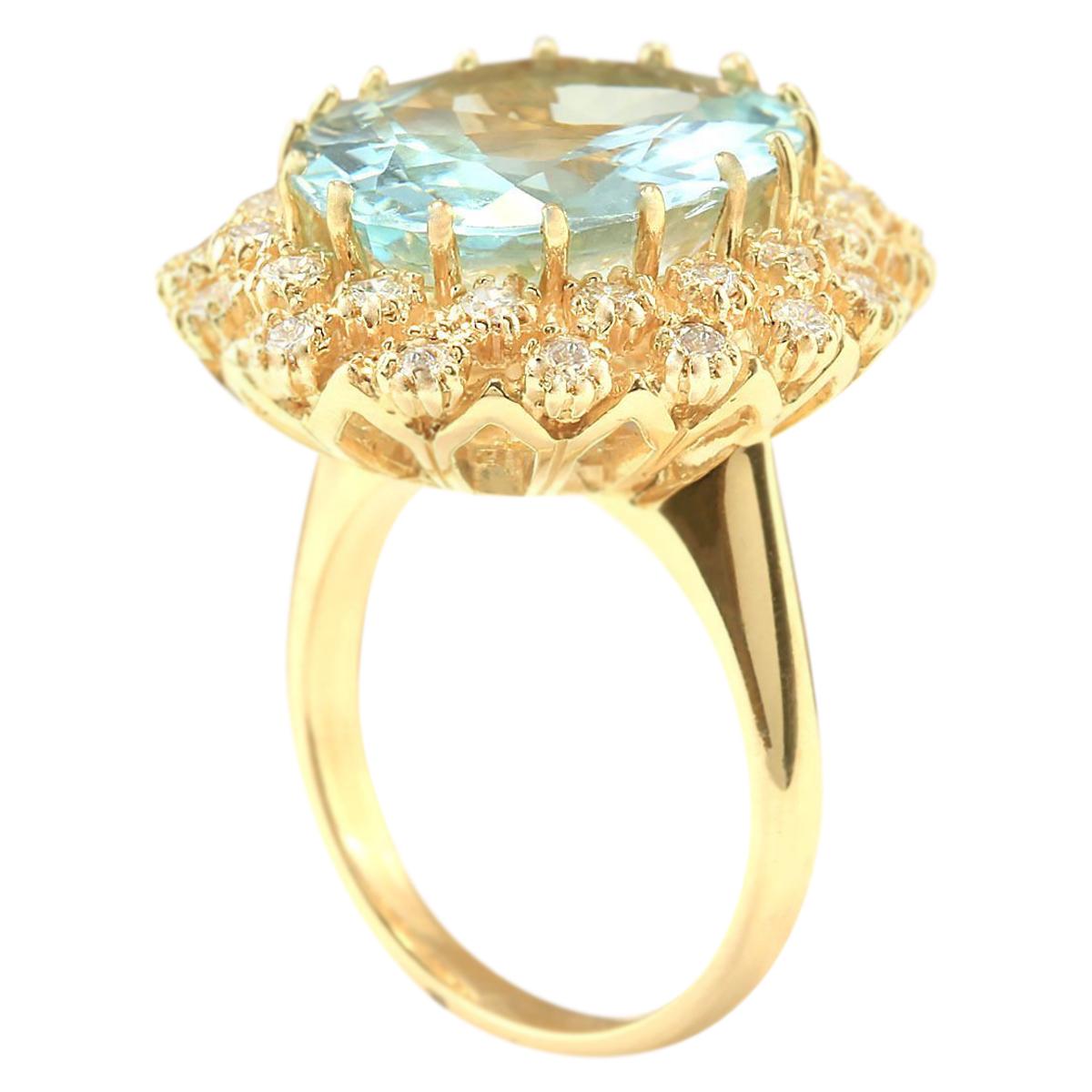 Oval Cut Aquamarine Diamond Ring In 14 Karat Yellow Gold  For Sale