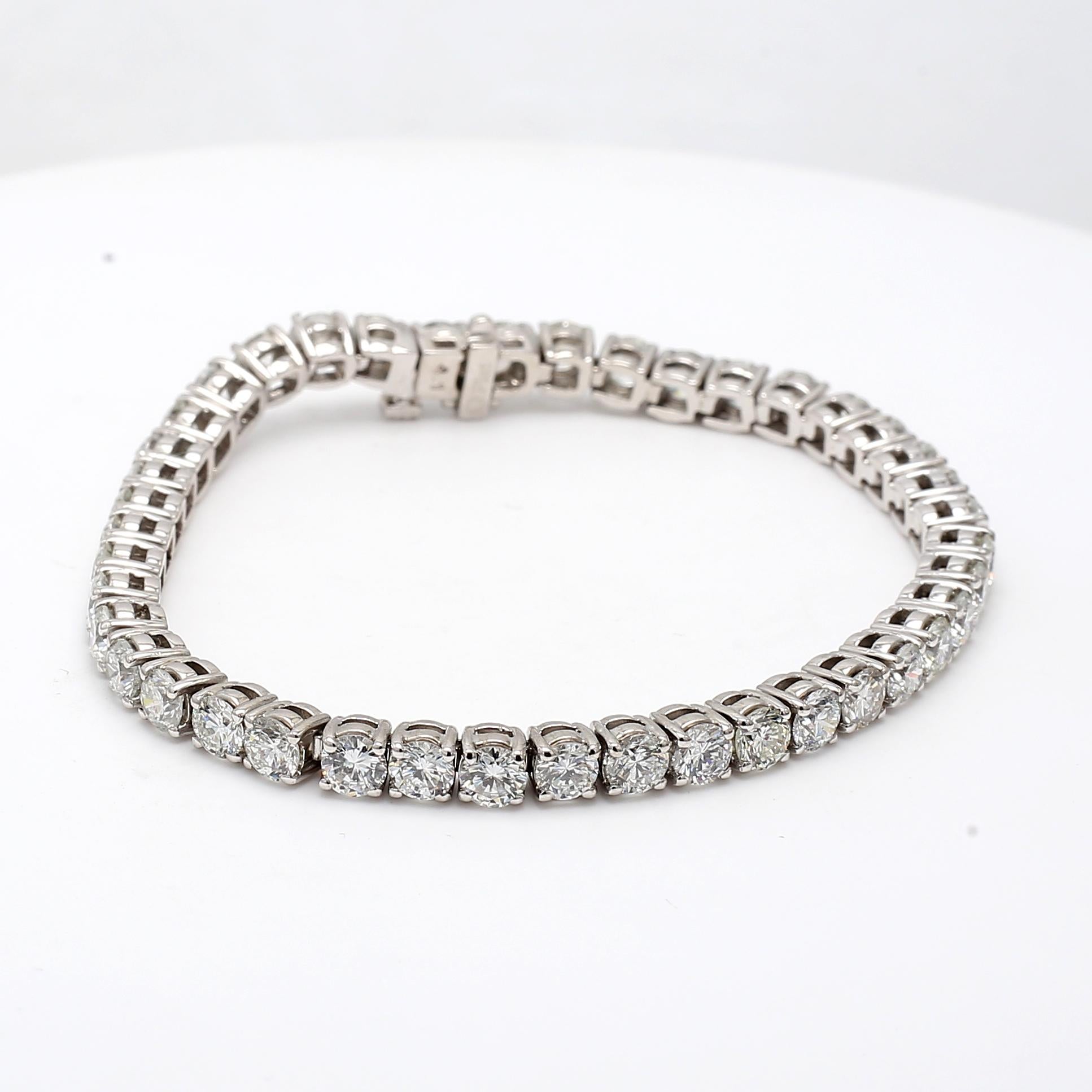 Title:
10.28 Carat Round Brilliant H VS1 Diamond Platinum Tennis Bracelet


Style:
Tennis


Metal:
Platinum


Gemstone 1:
10.28 Carat Diamond


Number of Stones:
42


Color:
H


Clarity:
VS1


Shape:
Round Brilliant


Dimension:
7.00