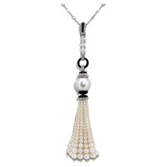 102.98 Carat Pearl Diamond and Onyx Tassel Necklace set on 18 Karat White Gold