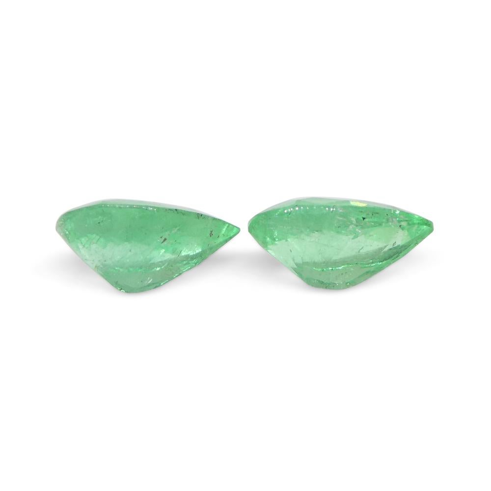 1.02ct Pair Pear Green Emerald from Colombia For Sale 2