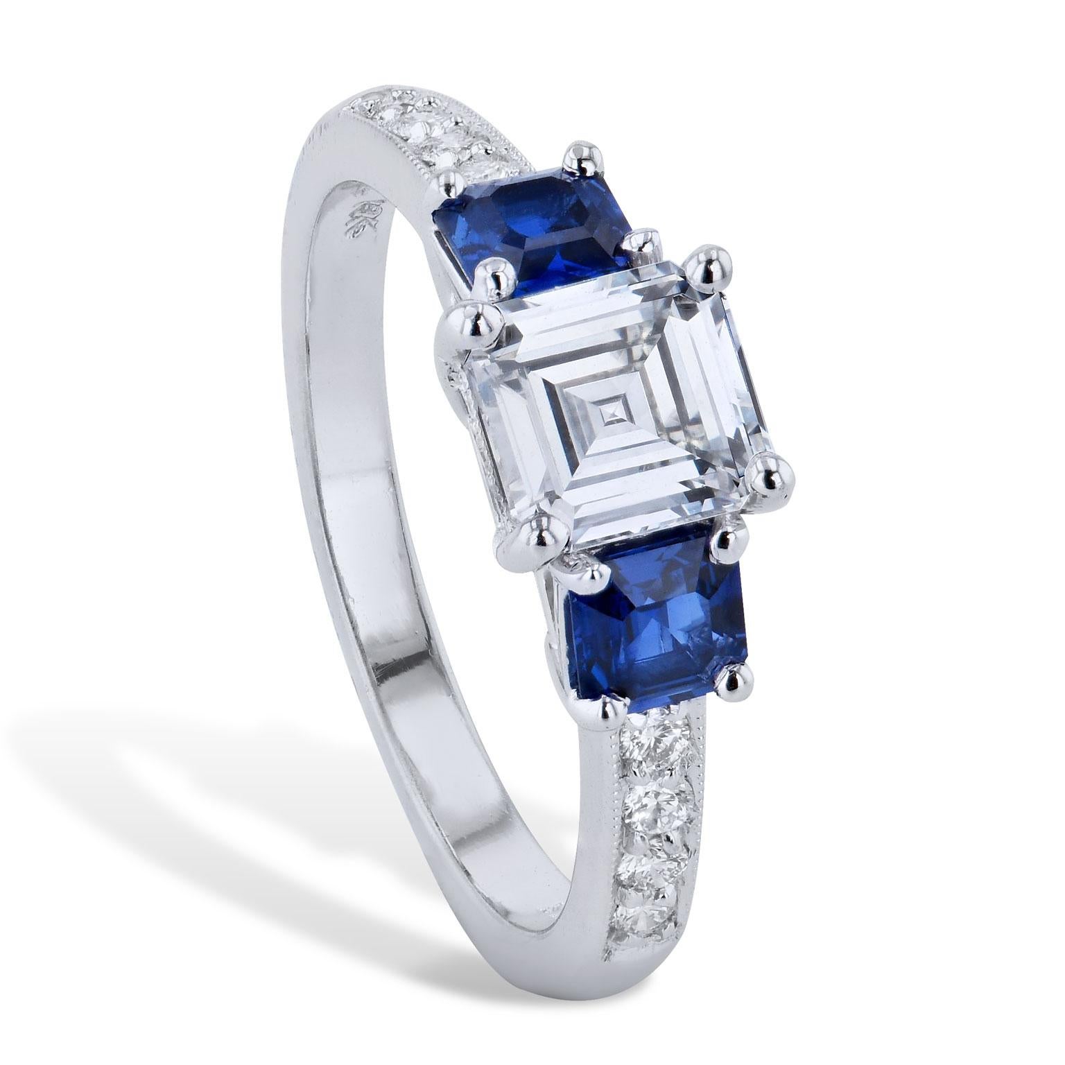H&H GIA Cert 1.02 carat Square Emerald Cut Diamond Ring 2 Assher Blue Sapphires

A Platinum engagement ring with 1.02 ct square Emerald cut diamond, G-VS2 (GIA cert# 12243899) prong-set in the center and 2 Assher blue sapphires set on either side