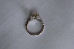 1.02Ct yellow sapphire and diamond ring in 18k solid gold