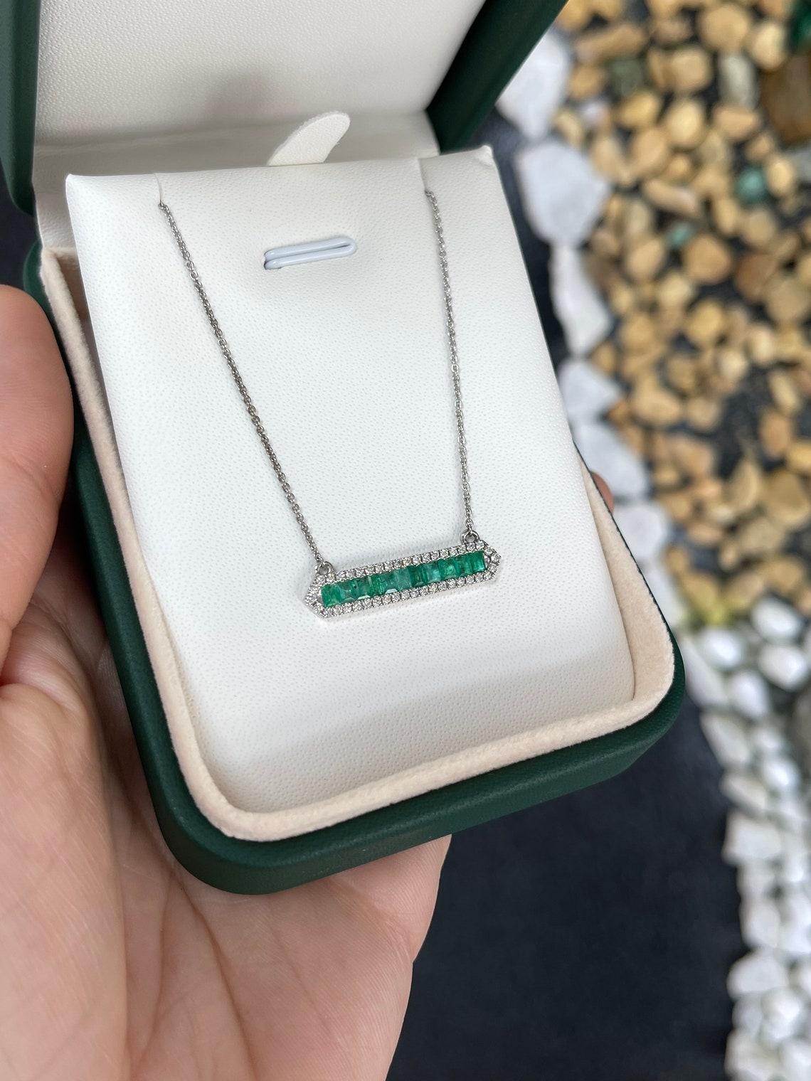 Modern 1.02tcw 14K Emerald Cut Emerald & Diamond Halo Bar Pendant Necklace White Gold For Sale