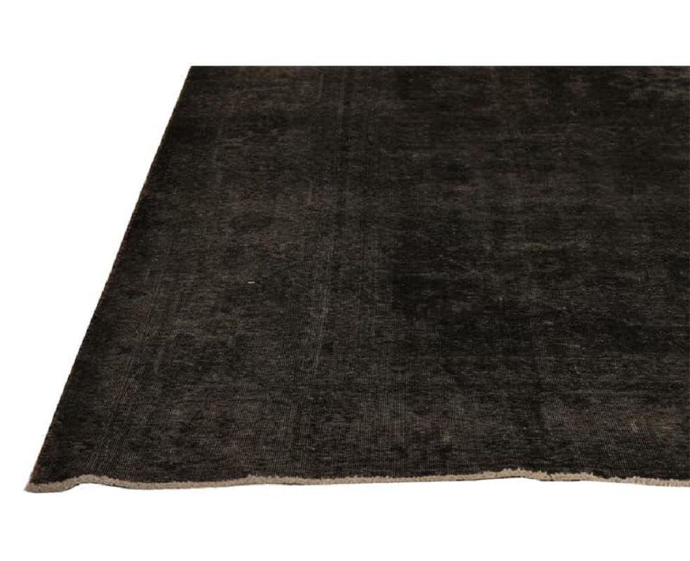 20th Century Vintage Distressed Overdyed Persian Rug For Sale