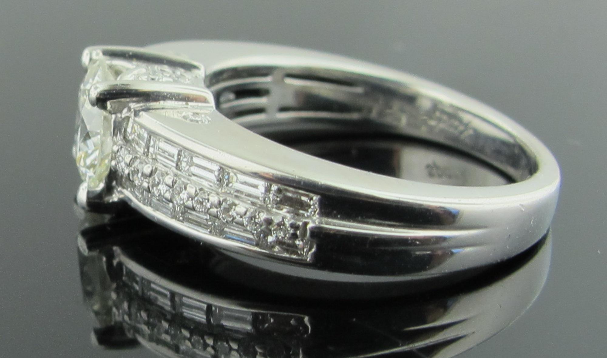 Round Cut 1.03 Carat Center Diamond in 18 Karat White Gold with 0.82 Carat of Diamonds For Sale