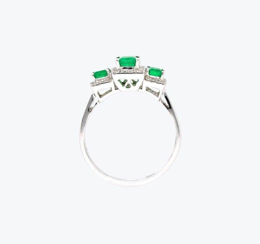 1.03 Carat Colombian Emerald, Diamond, and 18 Karat White Gold Three-Stone Ring For Sale 4