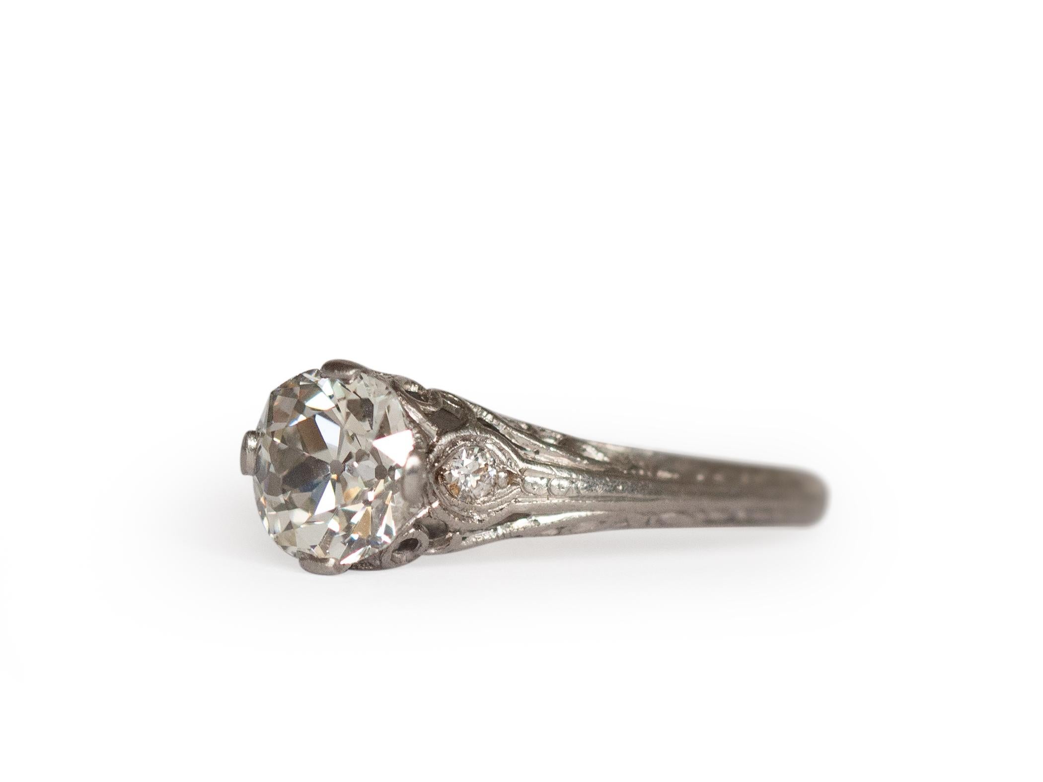 Item Details: 
Ring Size: 7.25
Metal Type: Platinum [Hallmarked, and Tested]
Weight: 3.0 grams

Center Diamond Details:
GIA REPORT #: 6213188147
Weight: 1.03 carat
Cut: Old Mine Brilliant (Antique Cushion)
Color: I
Clarity: VS1

Side Diamond