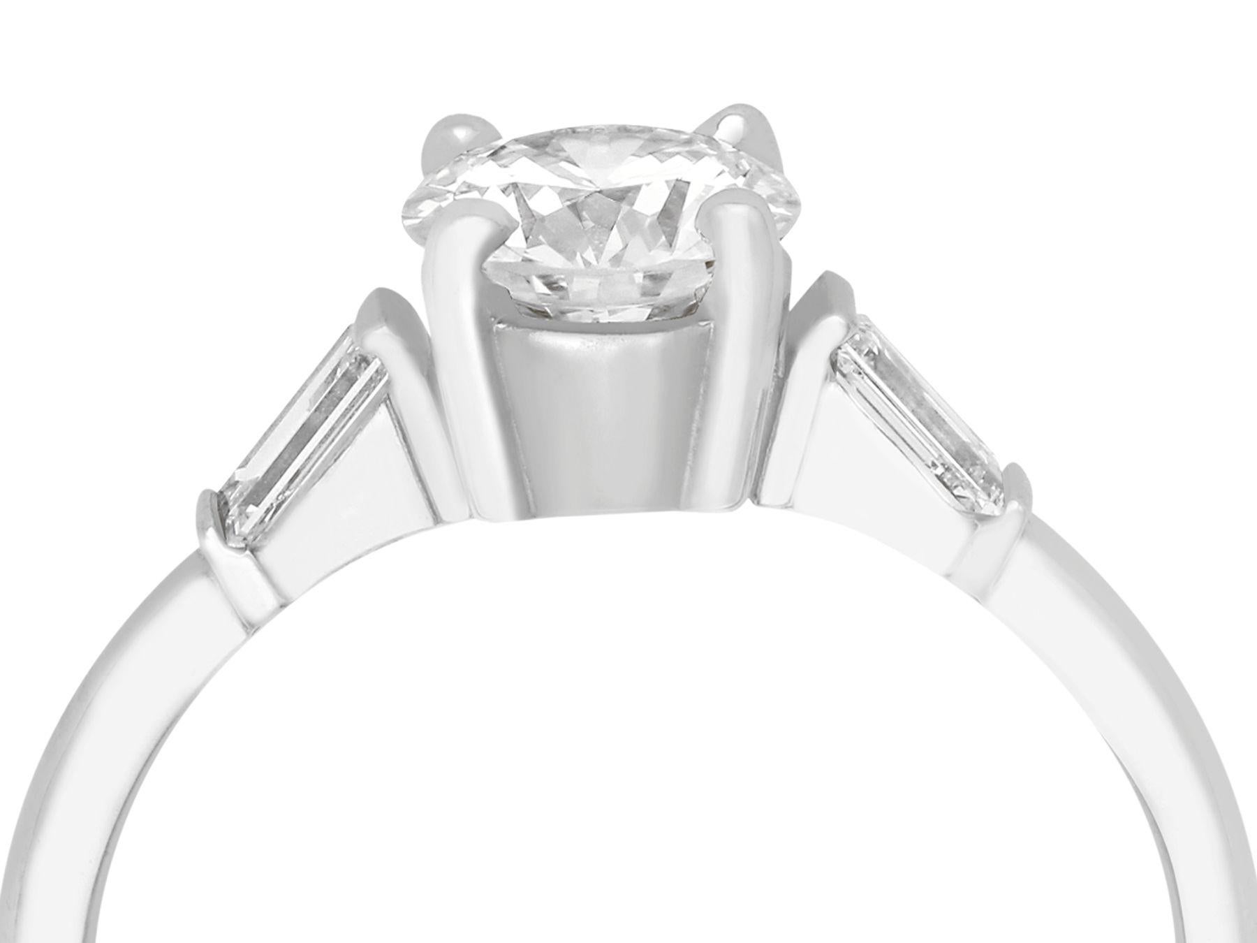 An impressive 1.38 carat (total) modern brilliant round cut diamond and platinum Art Deco style solitaire ring; part of our diverse range of diamond jewellery

This fine and impressive contemporary Art Deco style diamond solitaire ring has been