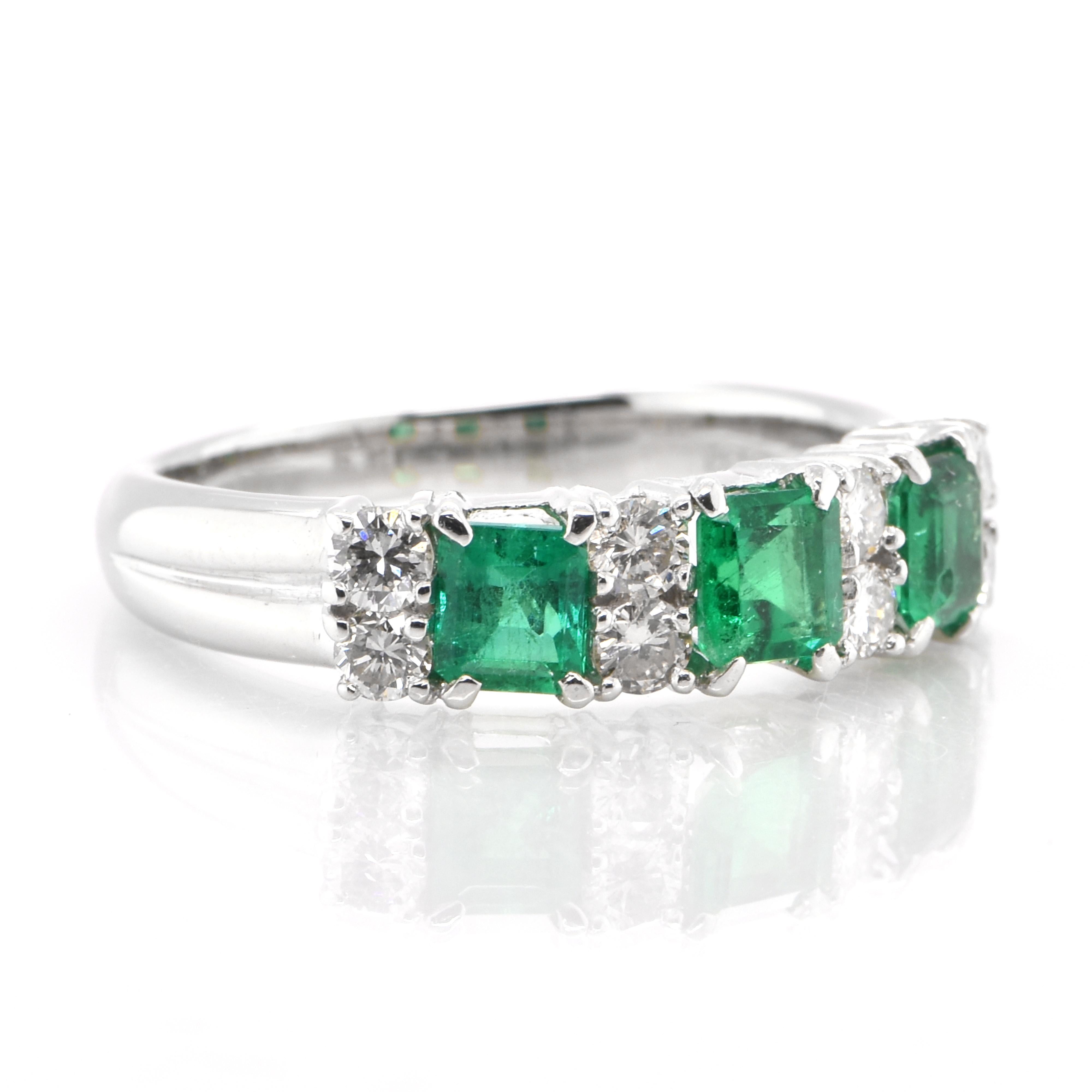 Modern 1.03 Carat Emerald and Diamond Half-Eternity Ring Set in Platinum
