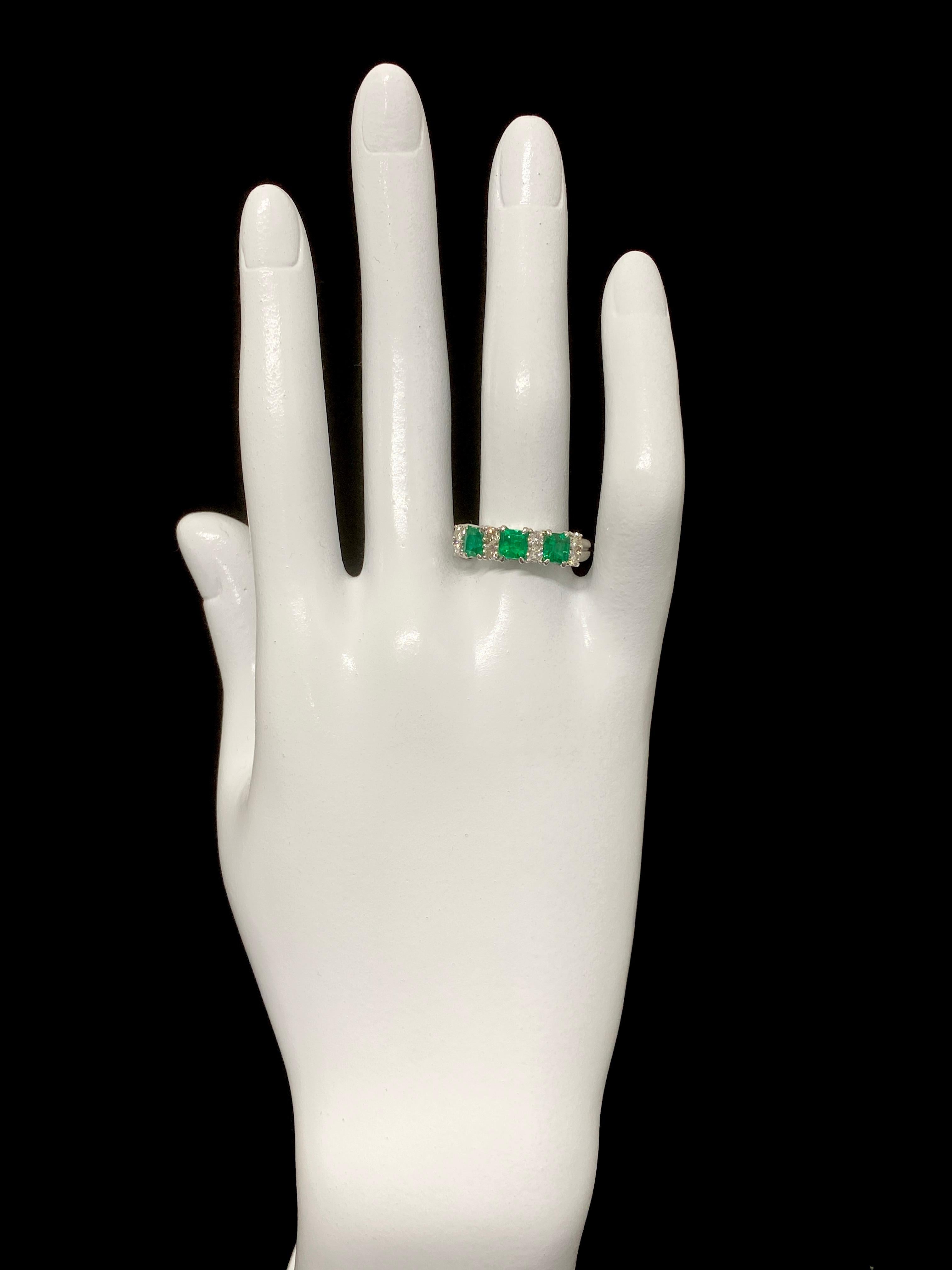 Women's 1.03 Carat Emerald and Diamond Half-Eternity Ring Set in Platinum