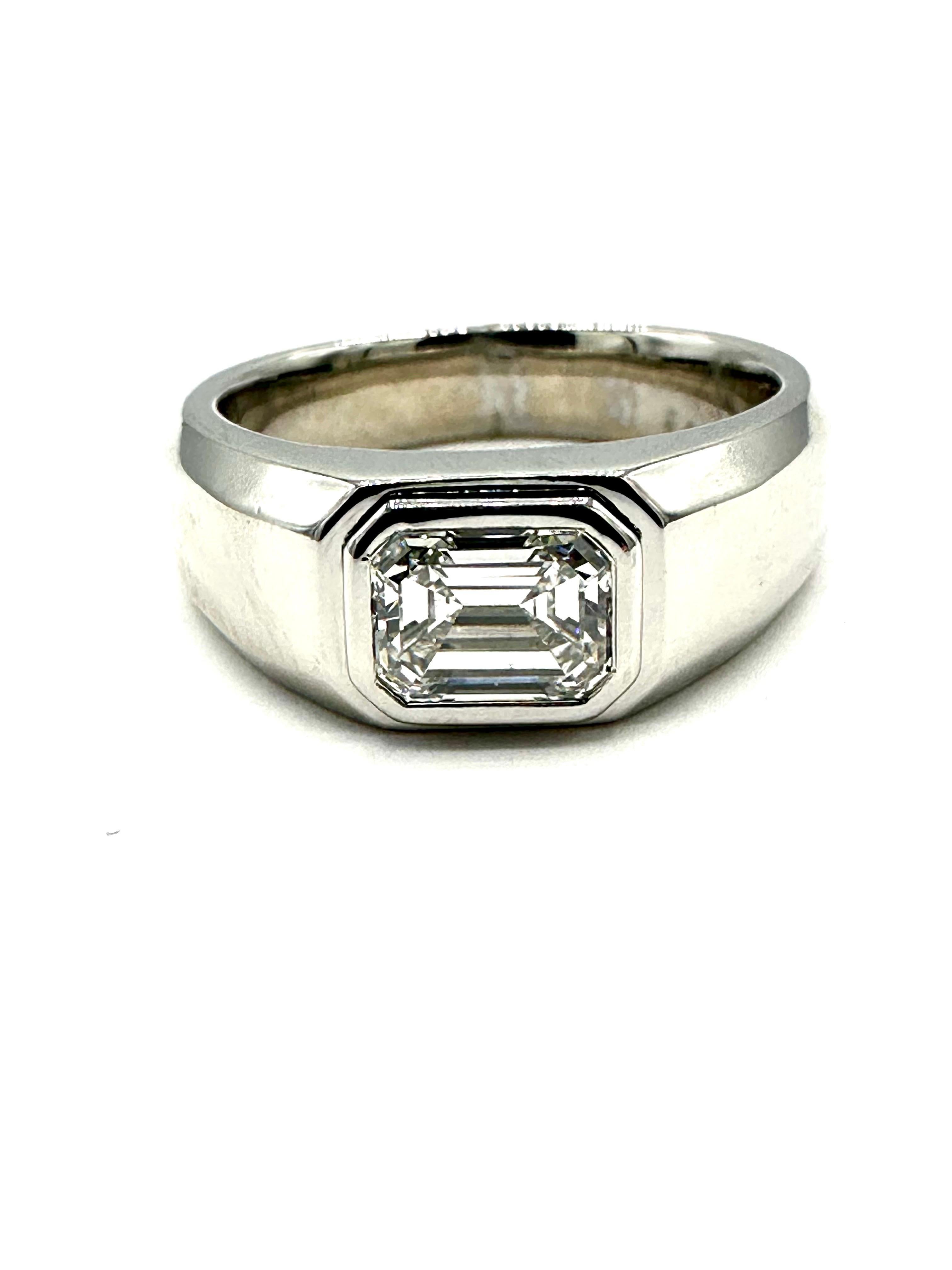 A great new design by Tiffany & Co.!  This is the Charles Tiffany Diamond men's ring!  The 1.03 carat emerald cut Diamond is bezel set in the Charles Tiffany platinum setting.  The Diamond has a Tiffany & Co. Diamond certificate number 73955831.  It