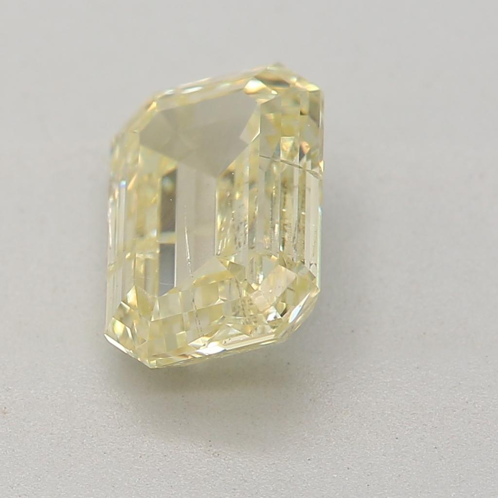 Emerald Cut 1.03 Carat Fancy Light Yellow Emerald cut diamond i1 Clarity GIA Certified For Sale