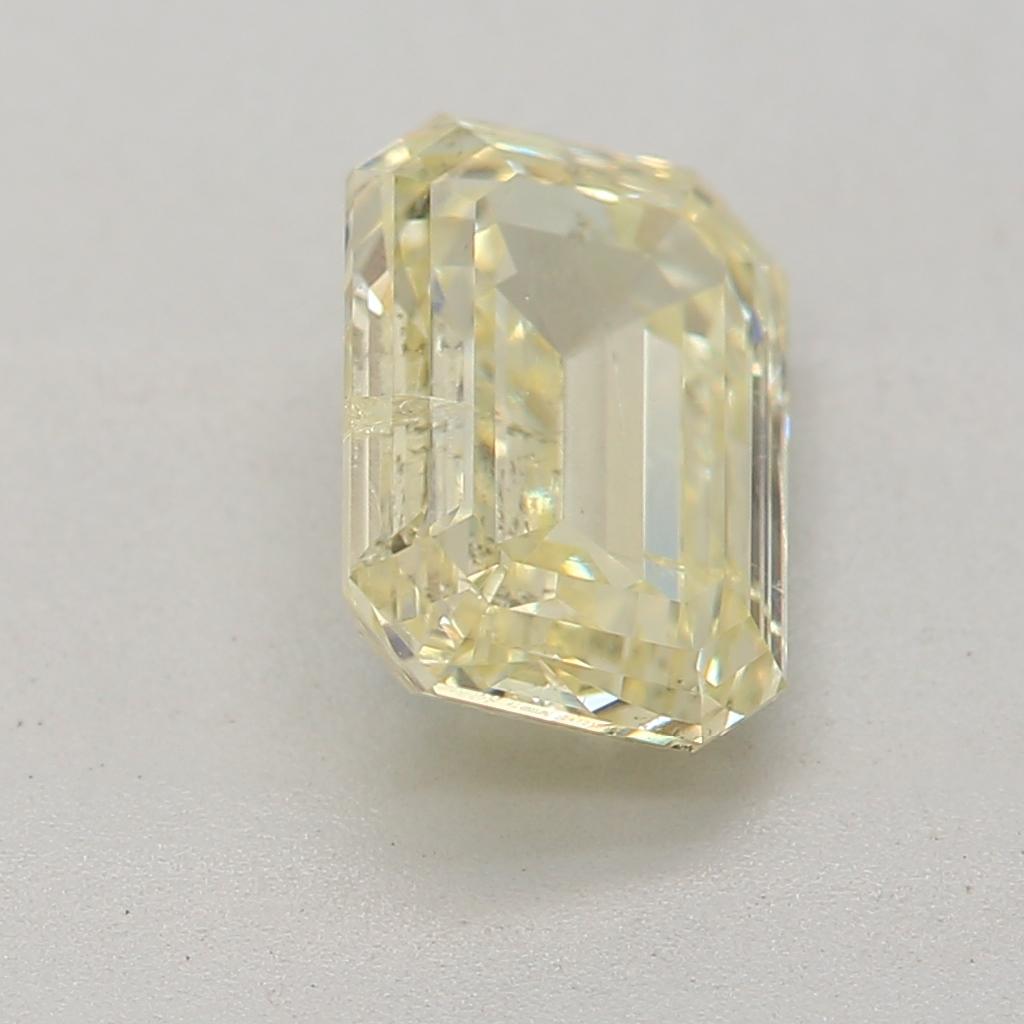 Women's or Men's 1.03 Carat Fancy Light Yellow Emerald cut diamond i1 Clarity GIA Certified For Sale