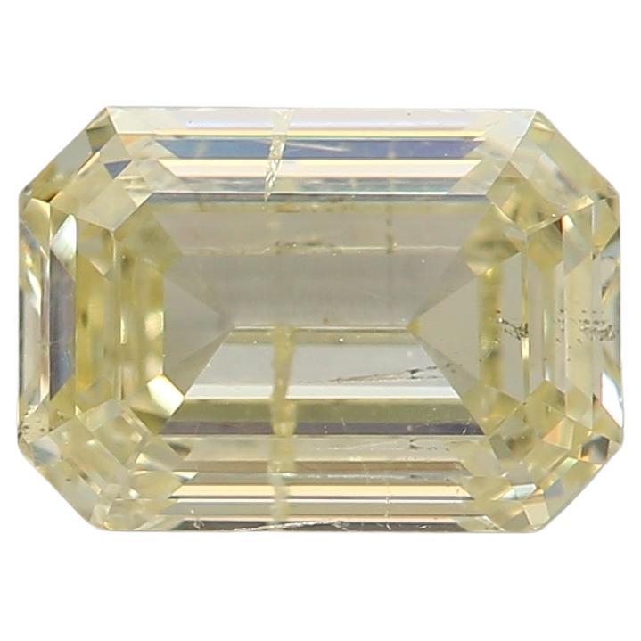 1.03 Carat Fancy Light Yellow Emerald cut diamond i1 Clarity GIA Certified For Sale