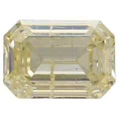 1.03 Carat Fancy Light Yellow Emerald cut diamond i1 Clarity GIA Certified