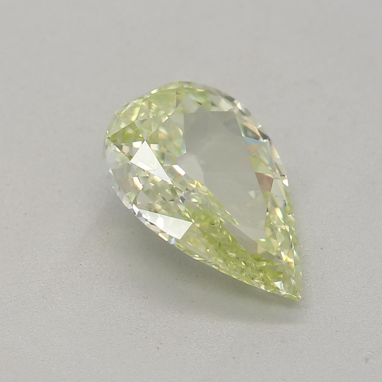 Women's or Men's 1.03 Carat Fancy Yellow Green Pear cut diamond SI1 Clarity GIA Certified For Sale