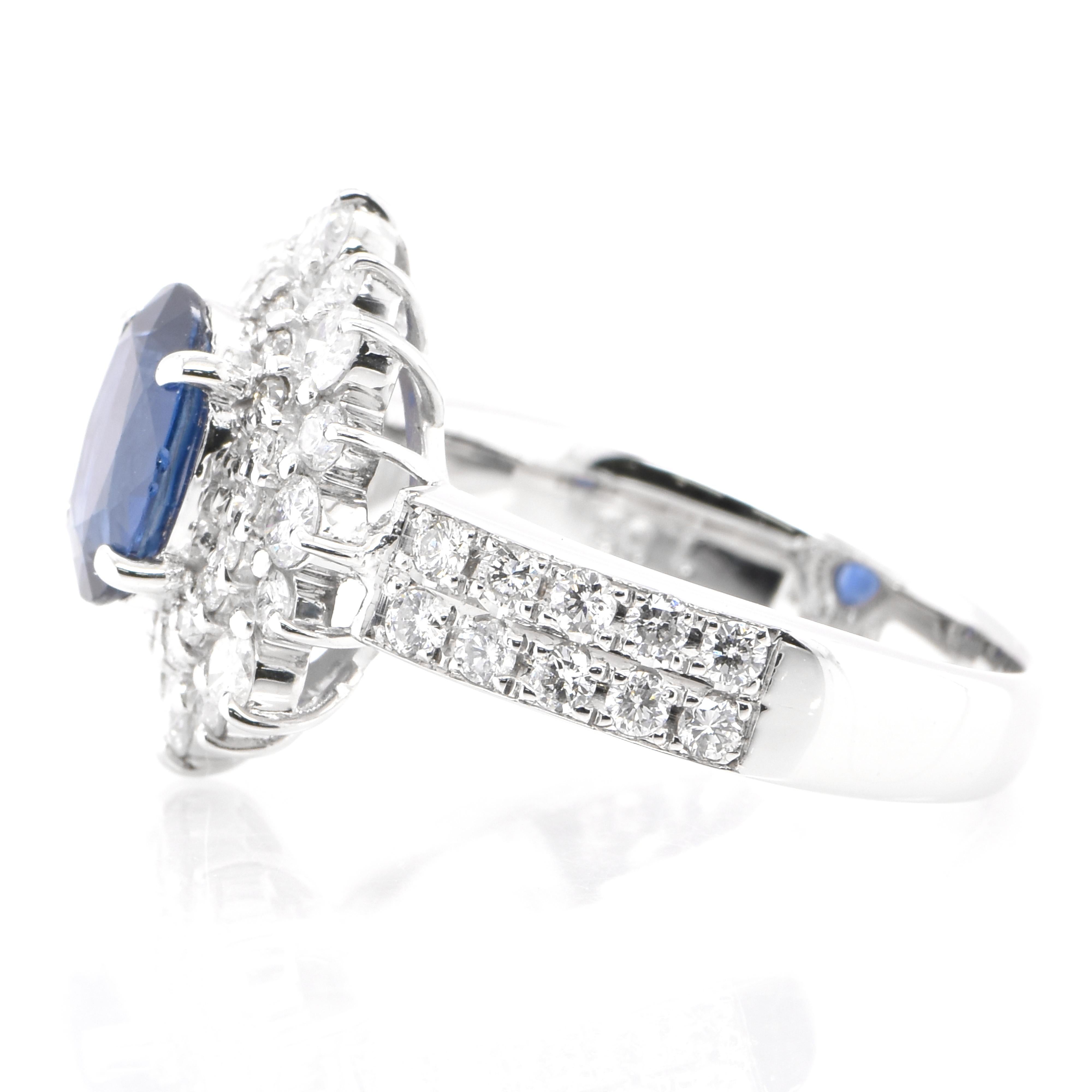 Oval Cut 1.03 Carat Natural Blue Sapphire and Diamond Double Halo Ring Made in Platinum For Sale