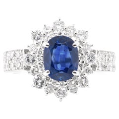 1.03 Carat Natural Blue Sapphire and Diamond Double Halo Ring Made in Platinum 1.03 Carat Natural Blue Sapphire and Diamond Double Halo Ring Made in Platinum