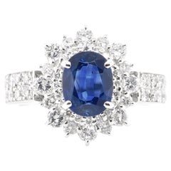 1.03 Carat Natural Blue Sapphire and Diamond Double Halo Ring Made in Platinum