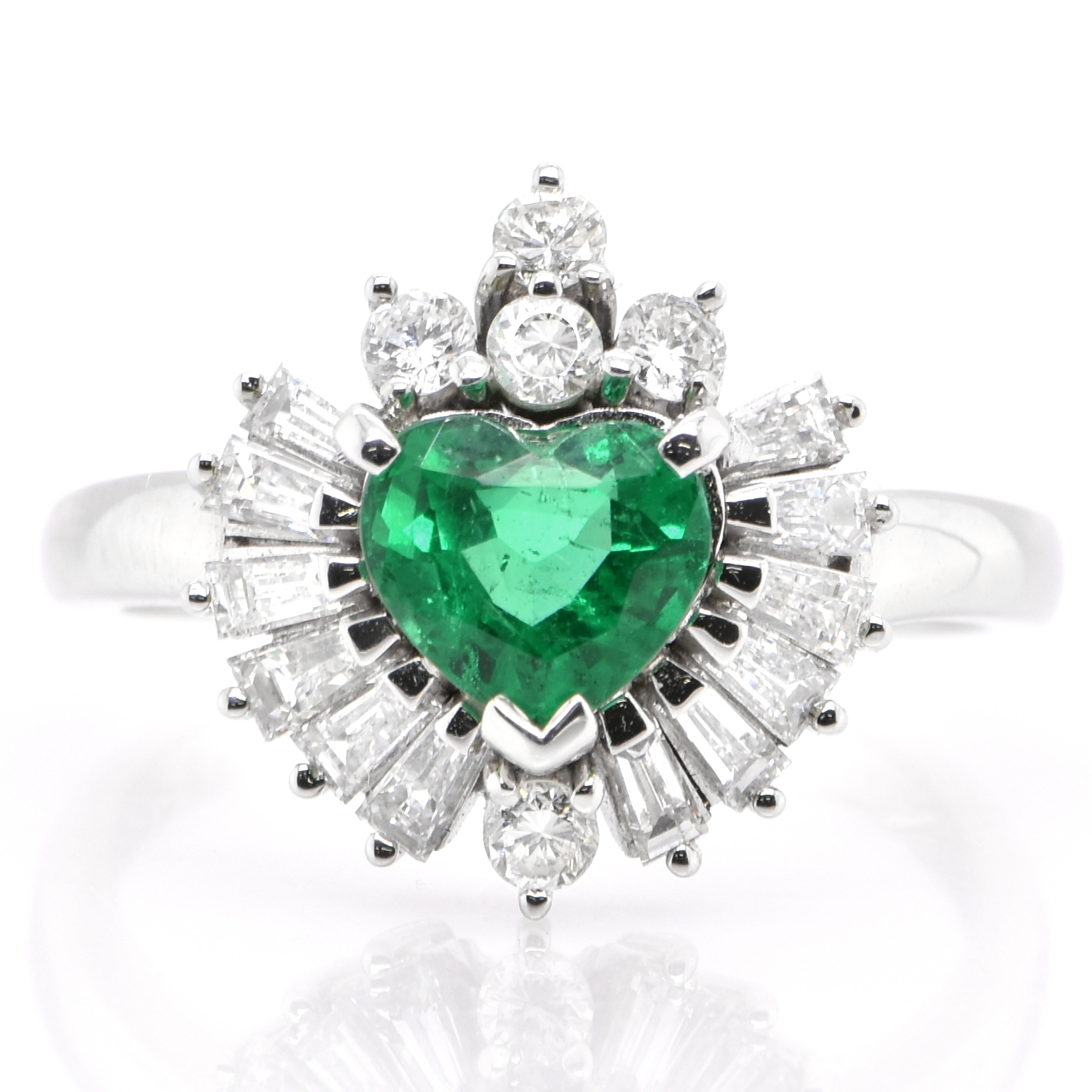 A stunning ring featuring a 1.037 Carat Natural Emerald and 0.88 Carats of Diamond Accents set in Platinum. People have admired emerald’s green for thousands of years. Emeralds have always been associated with the lushest landscapes and the richest