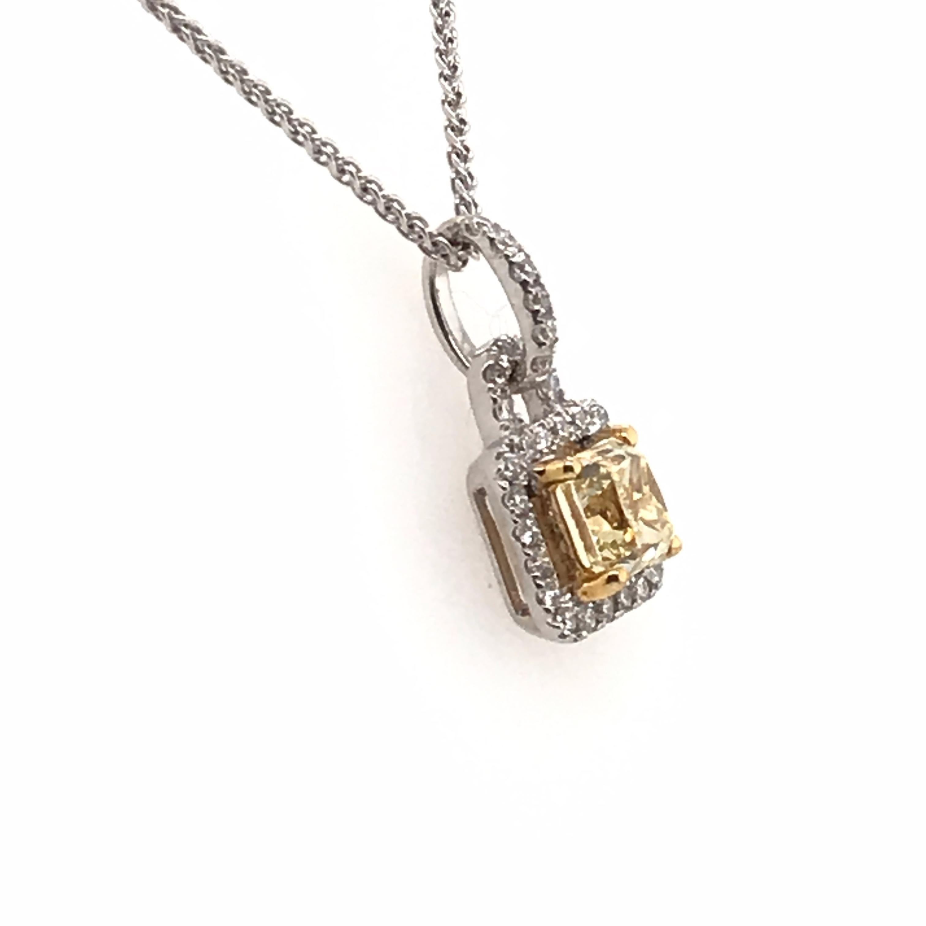 HJN Inc. Ring featuring a 1.03 Carat Natural Yellow Diamond Pendant.

Natural Yellow Diamond Weight: 0.83 Carats
Round-Cut Diamond Weight: 0.20 Carats

Total Stones: 32
Clarity Grade: VS1
Color Grade: H
Total Diamond Weight: 1.03
Polish and