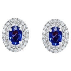 1.03 Carat Oval Cut Blue Sapphire and Diamond Stud Earrings in 18K White Gold