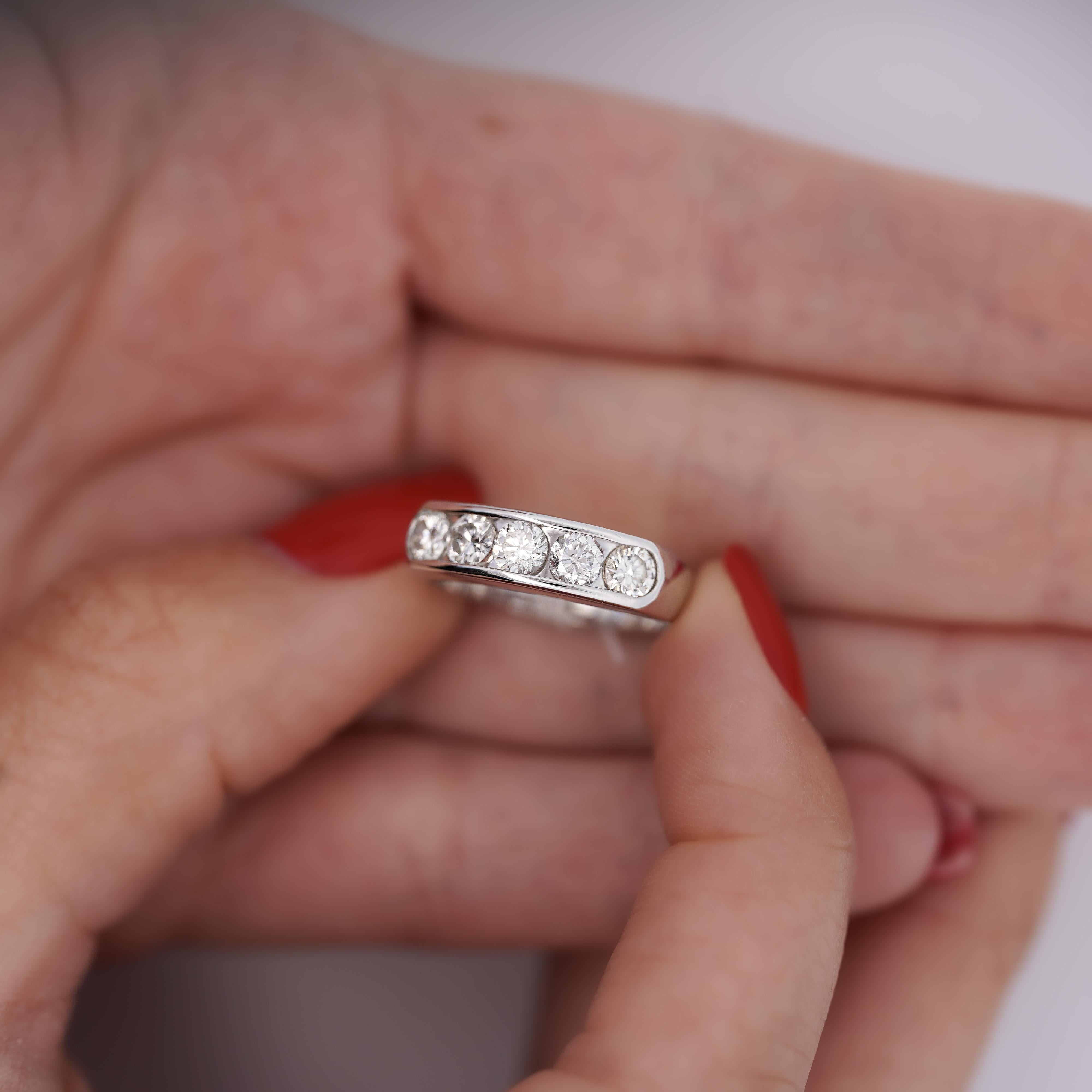 1.03 Carat Round-Cut Natural Diamond in Platinum 900 Channel Set Band Ring. 

Details: 
Item Type: Women's Ring
Metal: Platinum 900
Size: 7.25
Weight: 5.52 Grams
Width: 5.2 MM
 
Stone Details:
Type: Diamond
Carat: 1.03 CTTW
Color: G-H
Cut: