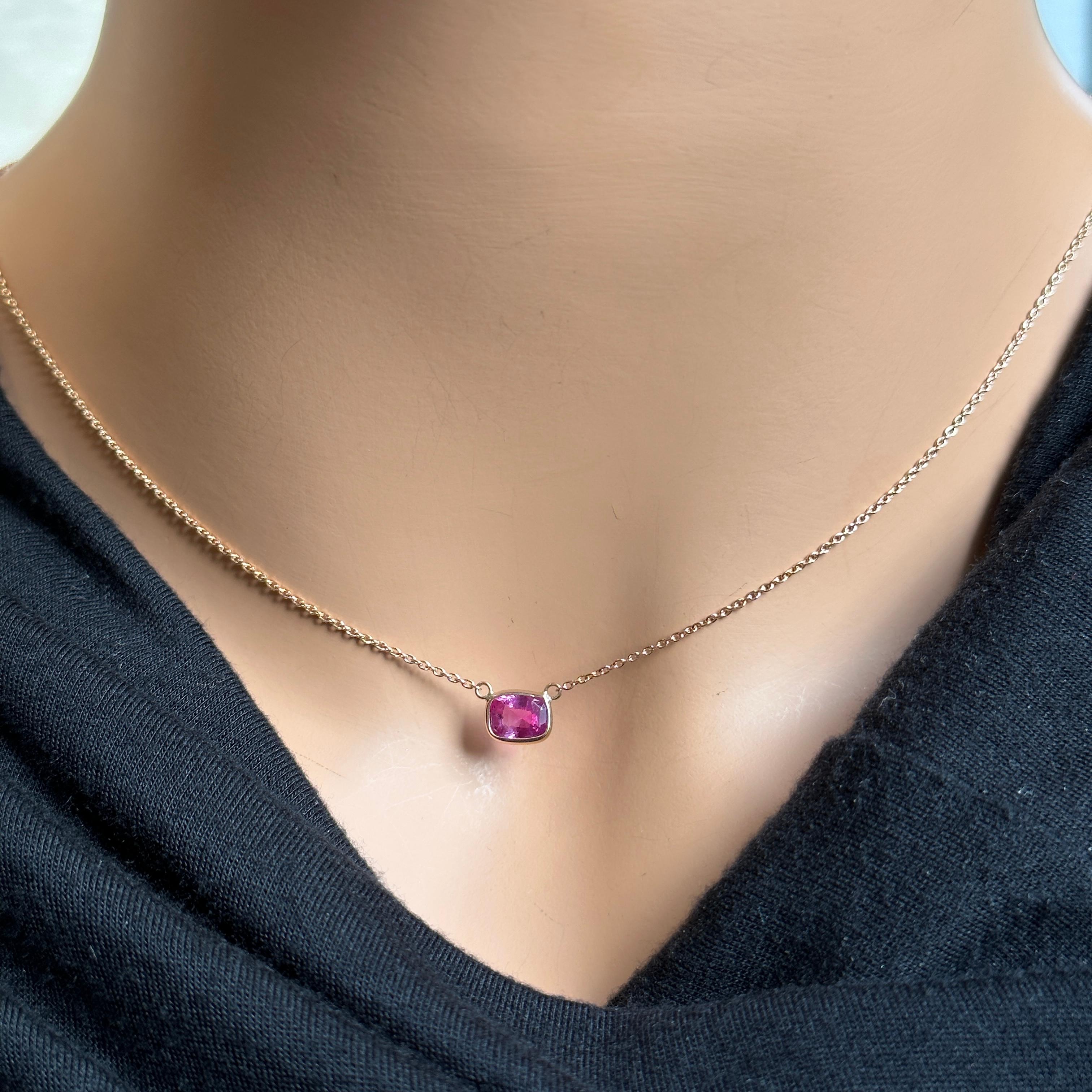 A fashion necklace made of 14k rose gold with a main stone of a certified pink cushion-cut sapphire weighing 1.03 carats would be a stunning and feminine choice. Pink sapphires are known for their delicate and romantic color, and the cushion cut