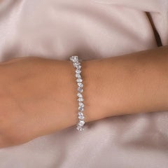 Brazalete de tenis con diamantes talla brillante SI/H de 10,3 quilates y oro blanco de 14 quilates