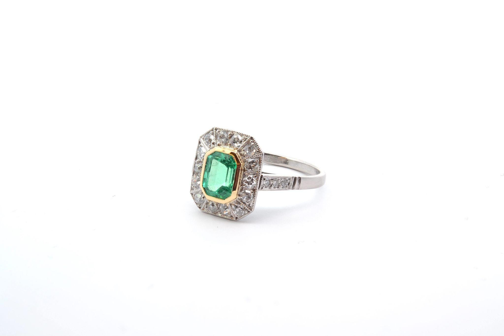 Emerald Cut  1.03 carats emerald ring with diamonds  For Sale