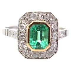 Vintage  1.03 carats emerald ring with diamonds 