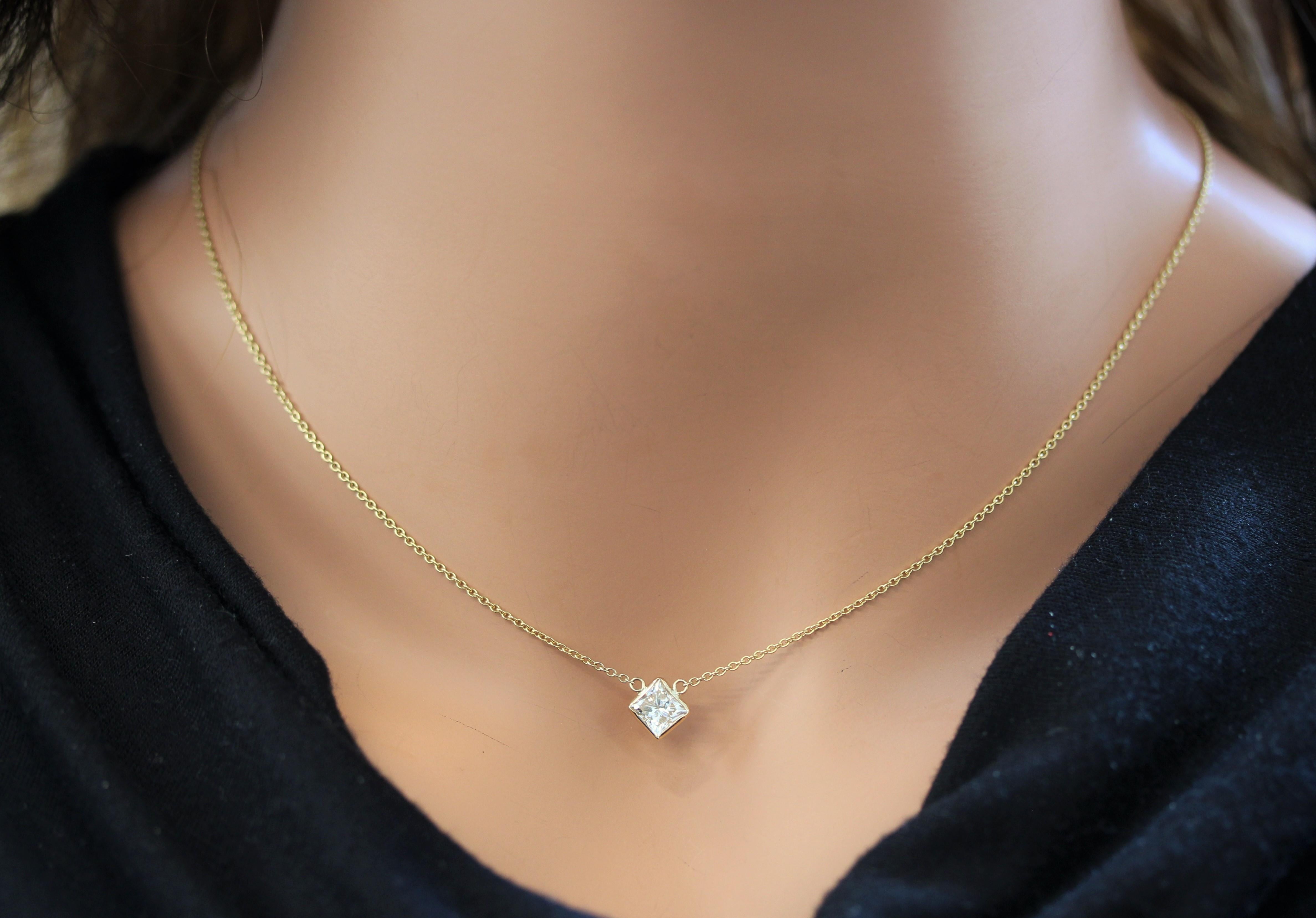 Make a statement worn solo and level up your collar candy when layered. How would you wear it? This is a natural Princess, color SI2 and clarity J, handmade necklace wire-wrapped in 14k  yellow gold. This is a piece you'll wear forever. We made them