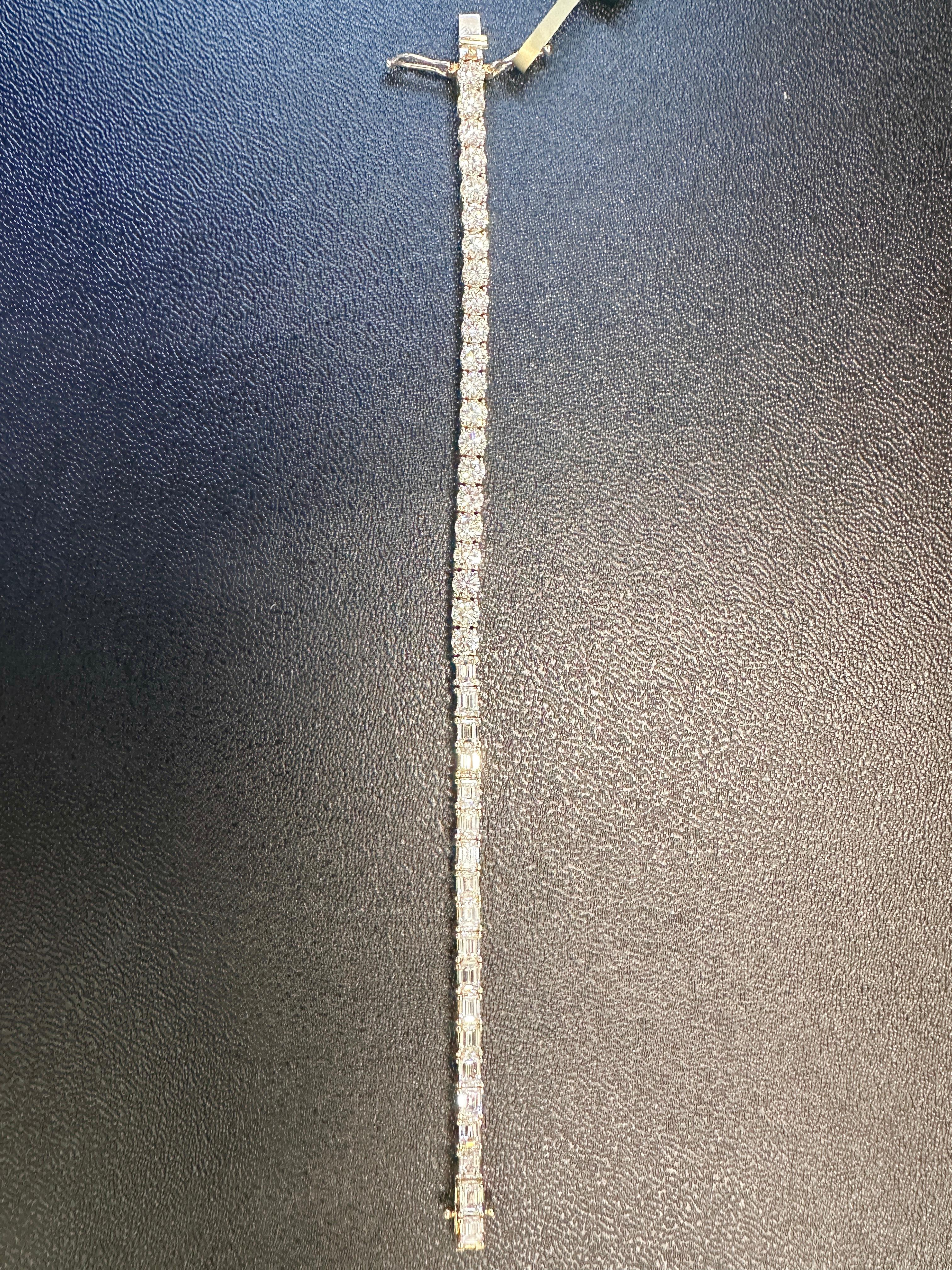 This stunning diamond tennis bracelet blends the timeless elegance of round brilliant-cut diamonds with the sleek sophistication of emerald-cut diamonds, creating a captivating design that sparkles from every angle. With an impressive total weight