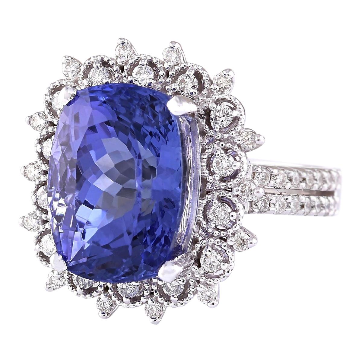 Experience the unparalleled allure of this exquisite Natural Tanzanite Diamond Ring, a captivating masterpiece crafted in opulent 14K White Gold. Weighing a remarkable 10.30 carats in total, this ring is a true embodiment of luxury and
