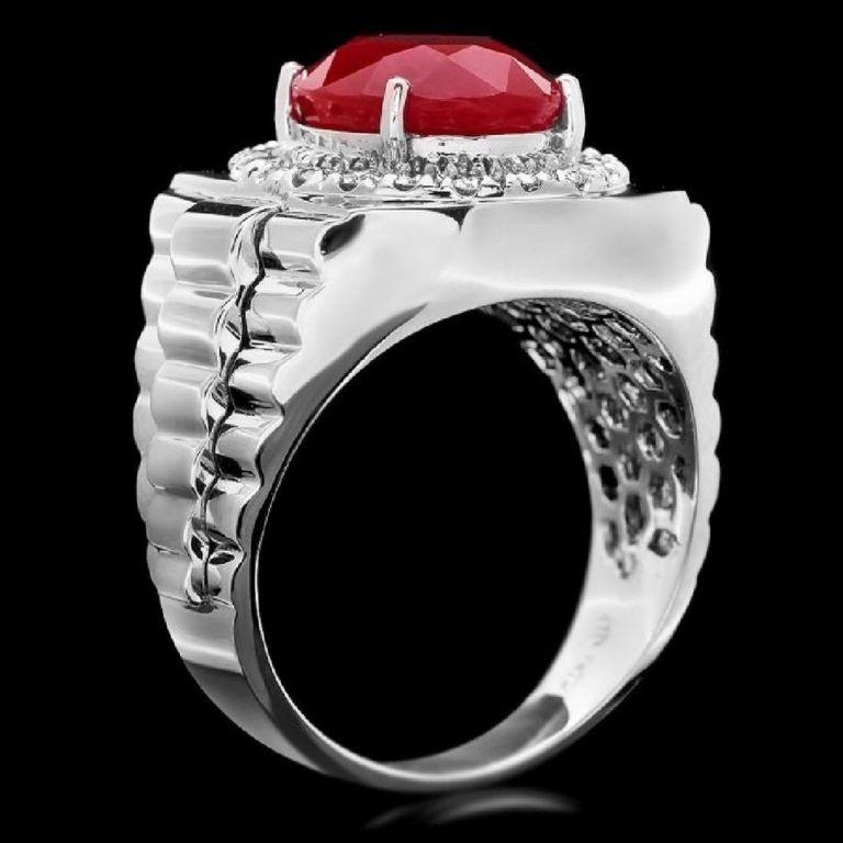 10.30 Carats Natural Diamond & Ruby 14K Solid White Gold Men's Ring

Amazing looking piece!

Total Natural Round Cut Diamonds Weight: Approx. 0.80 Carats (color G-H / Clarity SI1-SI2)

Total Ruby Weight is: Approx. 9.50ct

Ruby Measures: Approx.