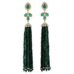 Boucles d'oreilles à pompon en or 18 carats avec diamants et émeraudes de 103,05 carats