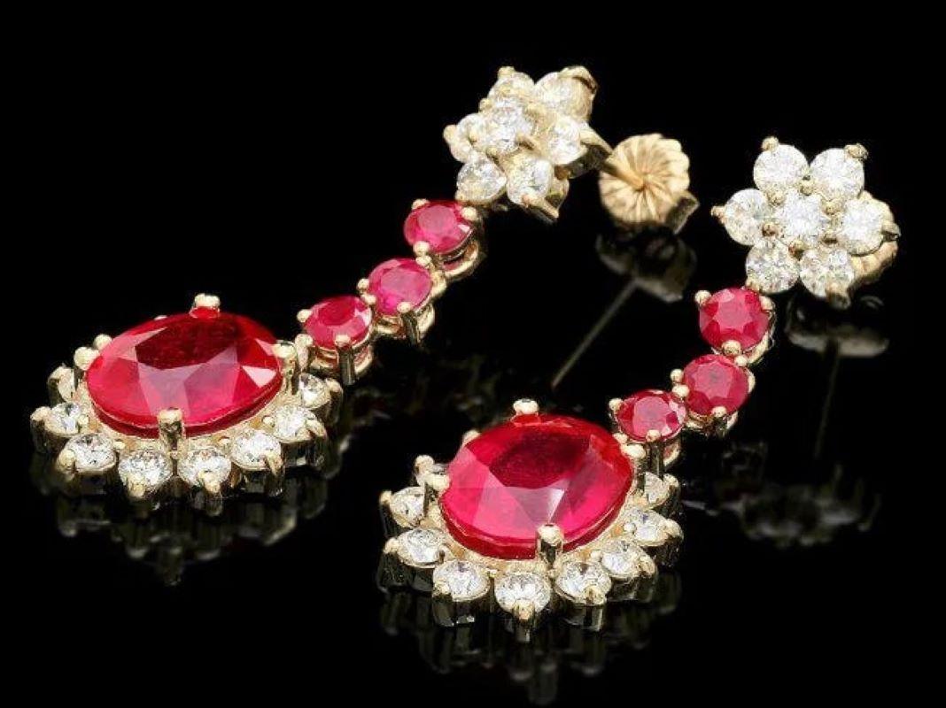 10.30Ct Natural Ruby and Diamond 14K Solid Yellow Gold Earrings

Total Natural Rubies Weight: Approx.  7.90 Carats

Ruby  Measures: Approx. 10 x 8 mm (2 oval)

Ruby  Measures: Approx. 3.3 mm (6 round)

Ruby Treatment: Fracture Filling

Total Natural